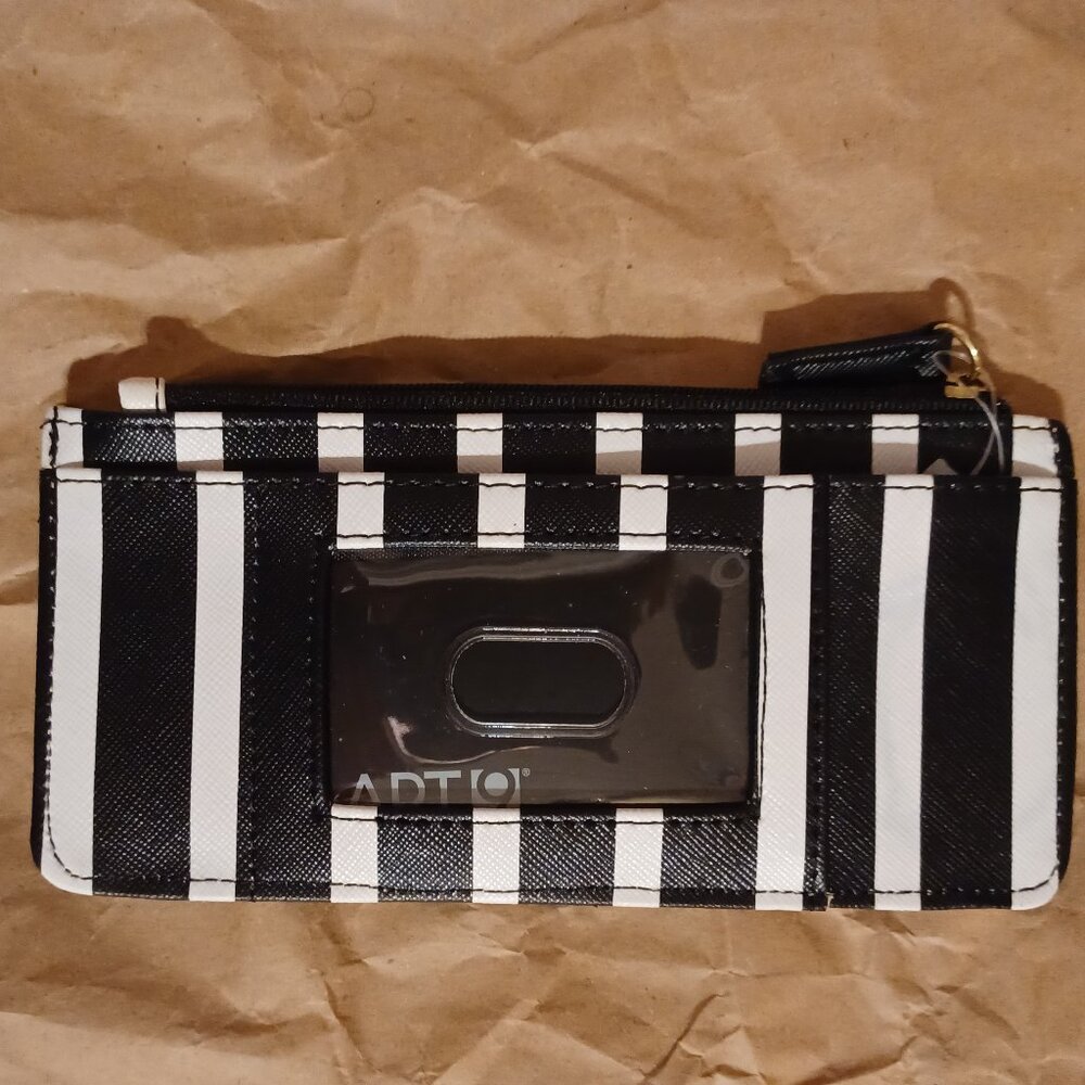 Apt 9 slim wallet Black/White Striped. Holds ID And 6 Credit cards